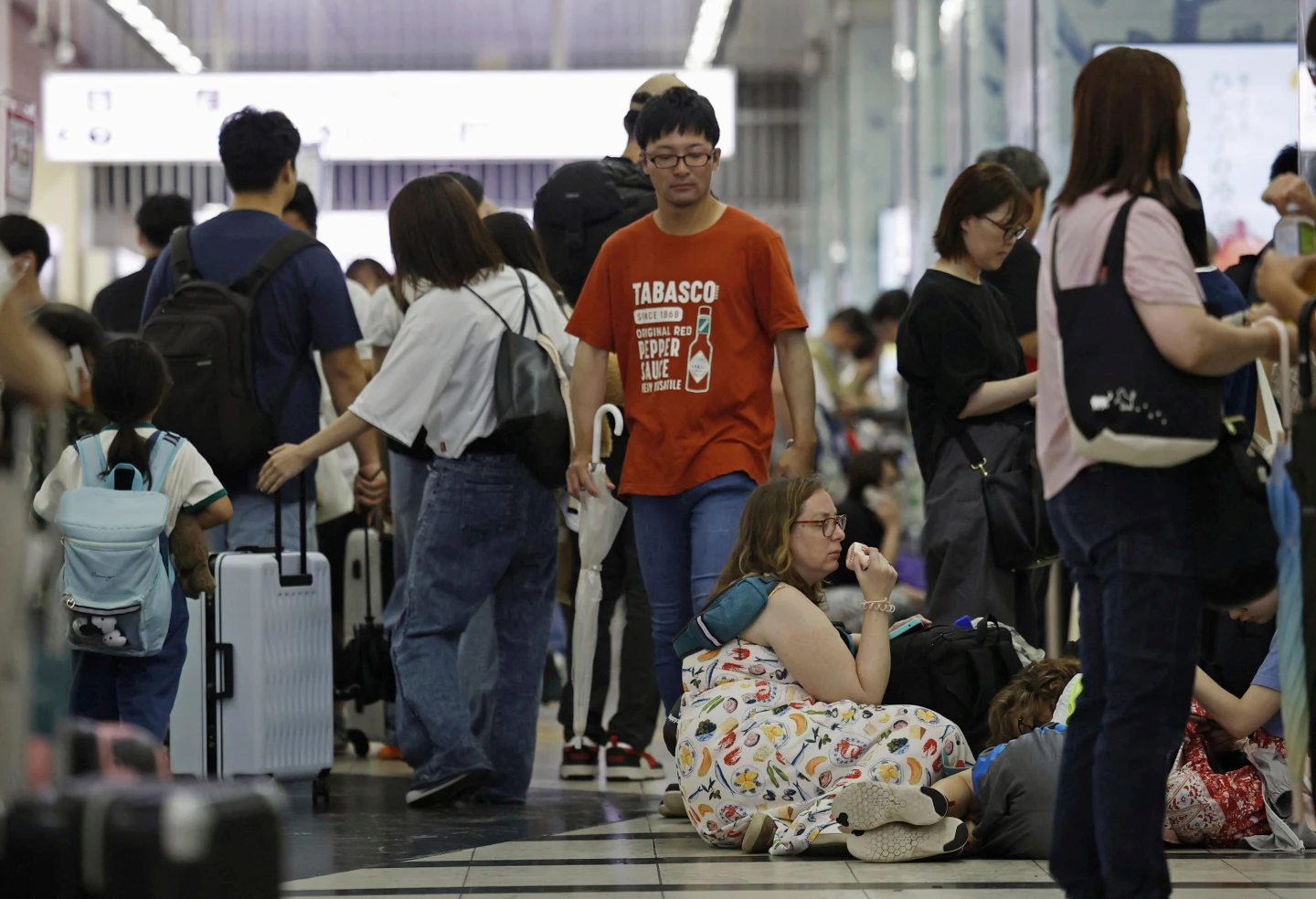 Severe Rainfall Disrupts Travel in Southern Japan