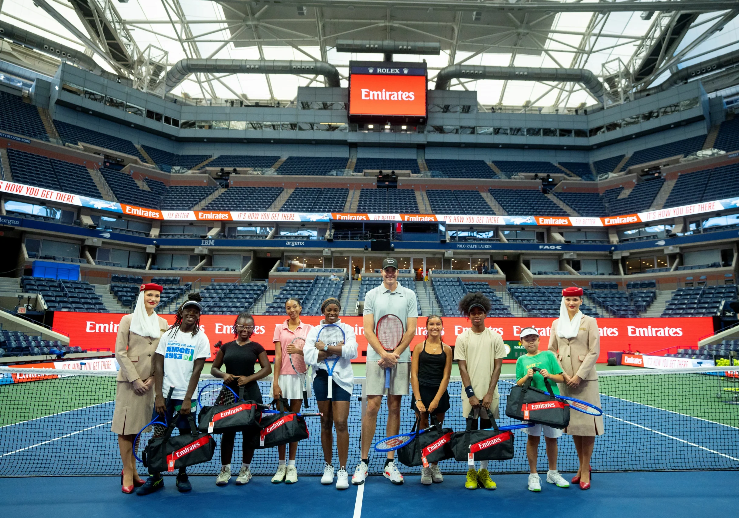 Emirates Conducts Tennis Clinic for Youngsters with Sloane Stephens and John Isner at the US Open